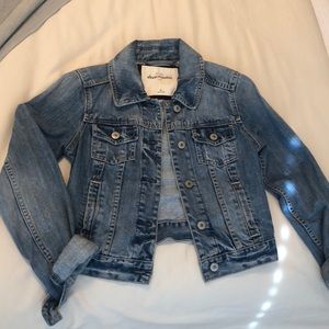 Distressed denim jacket